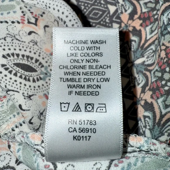 Maurices White and Green Blouse with Playful Pattern and Short Sleeves - Picture 10 of 10